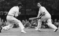 Compton is seen sweeping the ball